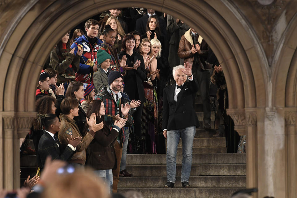 Lauren soaks up the applause after his 50th-anniversary fashion show in Central Park in 2018.