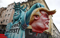 <p>A Carnival float depicting President Trump and the Statue of Liberty waits in a backstreet prior the traditional Carnival parade in Duesseldorf, Germany, on Monday, Feb. 27, 2017. REUTERS/Wolfgang Rattay </p>