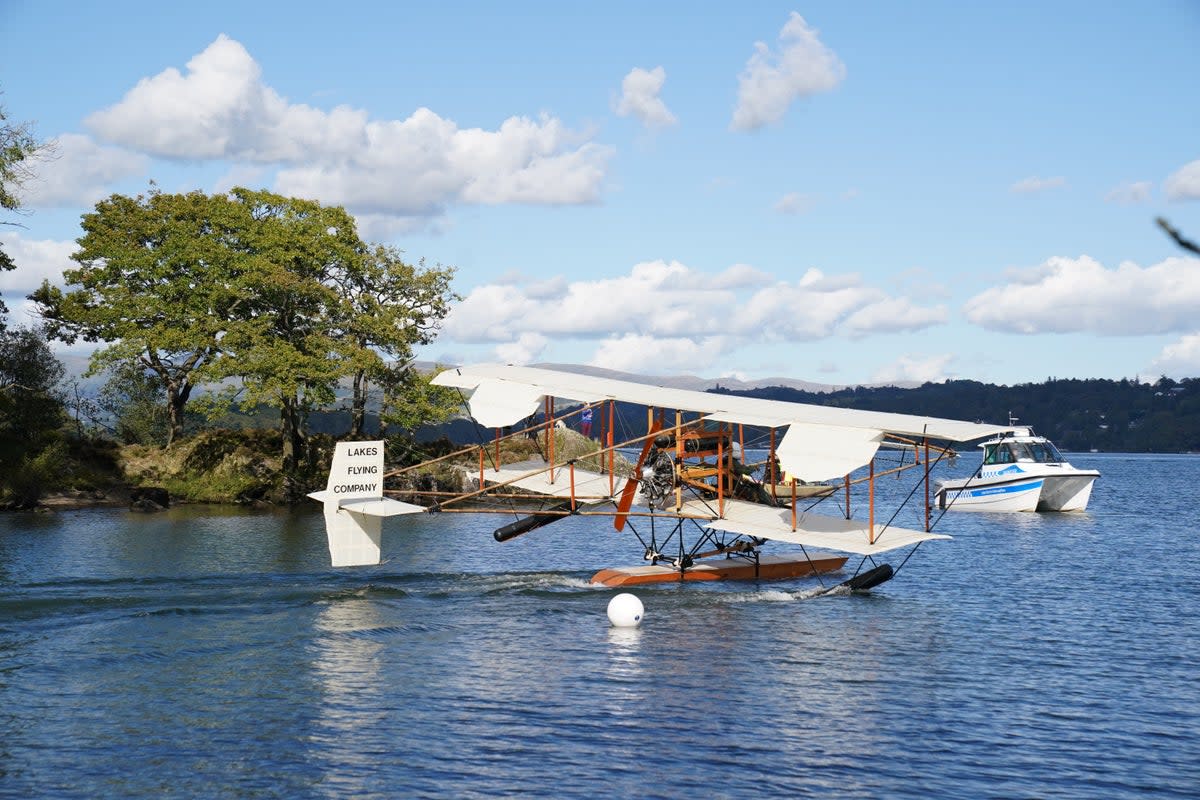 A replica of seaplane Waterbird on its first public flight on Lake Windermere in Cumbria (Owen Humphreys/PA) (PA Wire)