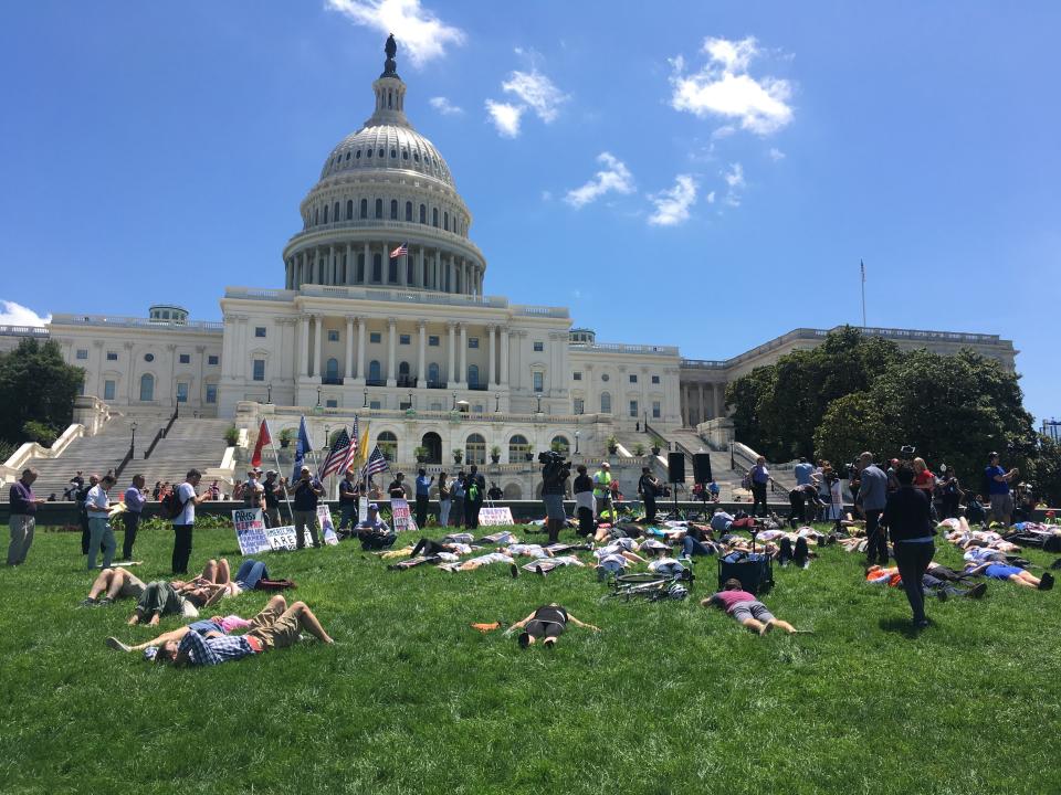 National Die-In participants lie&nbsp;outside the U.S. Capitol, June 12. The&nbsp;effort was launched by three students who say they&rsquo;re tired of legislative inaction in the face of massacres and routine gun violence. (Photo: Nick Wing)