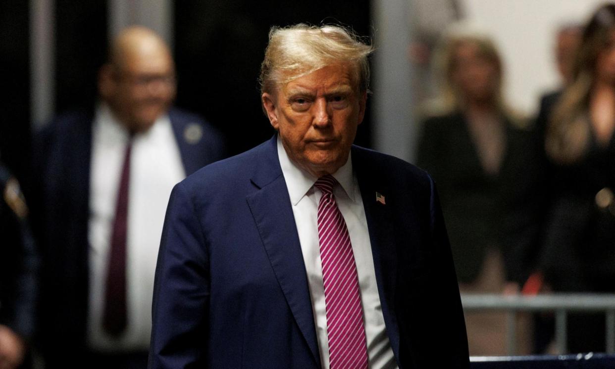 <span>Donald Trump outside court in New York on Friday.</span><span>Photograph: Sarah Yenesel/Reuters</span>