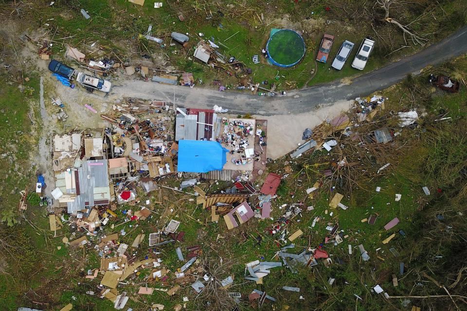 A house destroyed by hurricane winds is seen in Corozal, west of San Juan, Puerto Rico, on Sept.&nbsp;24 following the passage of Hurricane Maria. (Photo: RICARDO ARDUENGO via Getty Images)