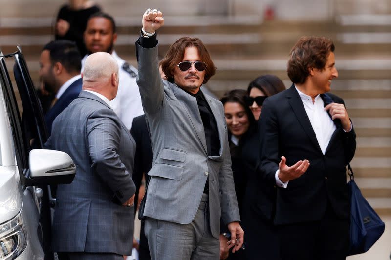 FILE PHOTO: Actors Johnny Depp and Amber Heard at the High Court in London