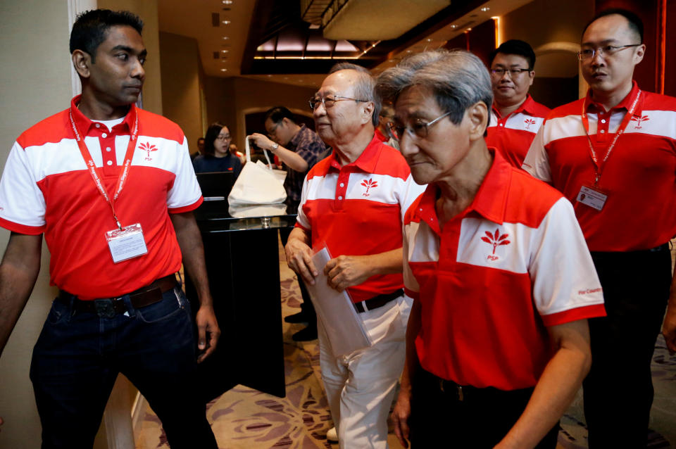 Members of the newly-launched Progress Singapore Party (PSP) and its leader Tan Cheng Bock are seen after a press conference in Singapore July 26, 2019. REUTERS/Feline Lim