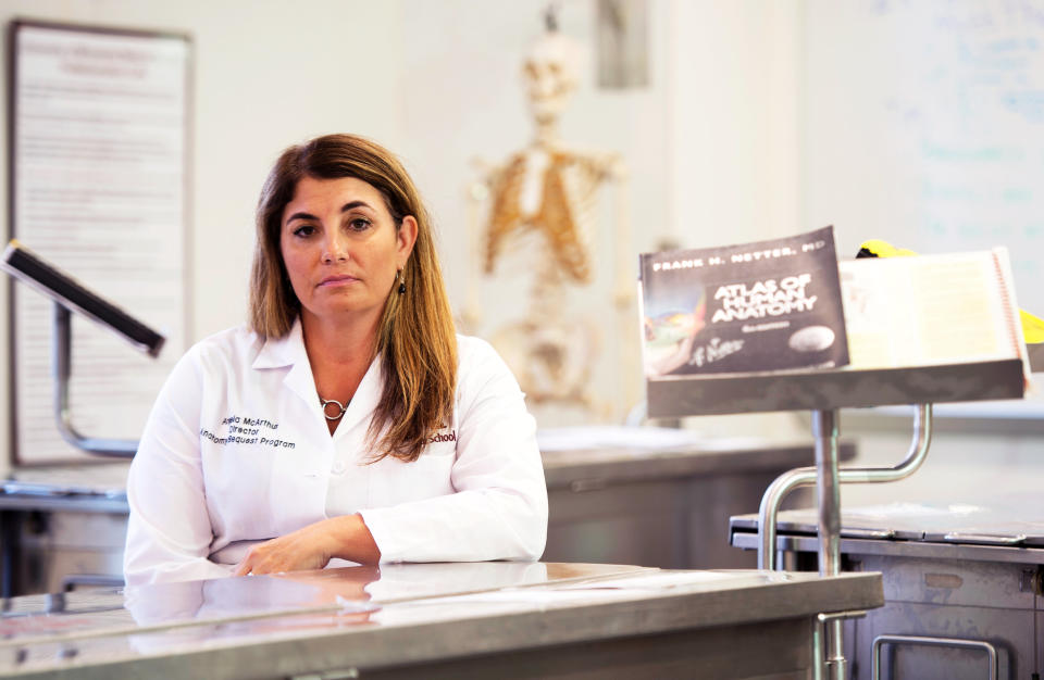 Angela McArthur, director of the body donation program at the University of Minnesota, poses in the Anatomy Bequest Laboratory in Minneapolis, Minnesota, U.S. August 15, 2017. Picture taken August 15, 2017. To match Special Report USA-BODIES/BROKERS REUTERS/Craig Lassig