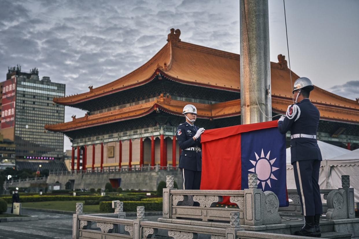 An honour guard during a flag raising ceremony at Chiang Kai Shek Memorial Hall in Taipei, Taiwan, on Wednesday, Dec. 27, 2023