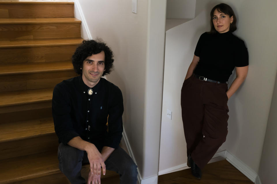 Neon White co-creator and game director Ben Esposito, left, and co-creator Geneva Hodgson pose for photos in Glendale, Calif., Monday, Dec. 5, 2022. Neon White is nominated for "Best Indie" in Thursday's Game Awards, the Oscars of the video game industry. (AP Photo/Jae C. Hong)