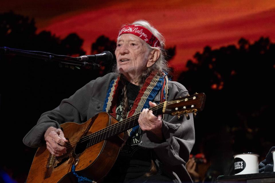 Willie Nelson, shown here performing at Farm Aid on Sept. 24, 2023, will be inducted into the Rock & Roll Hall of Fame on Nov. 3.