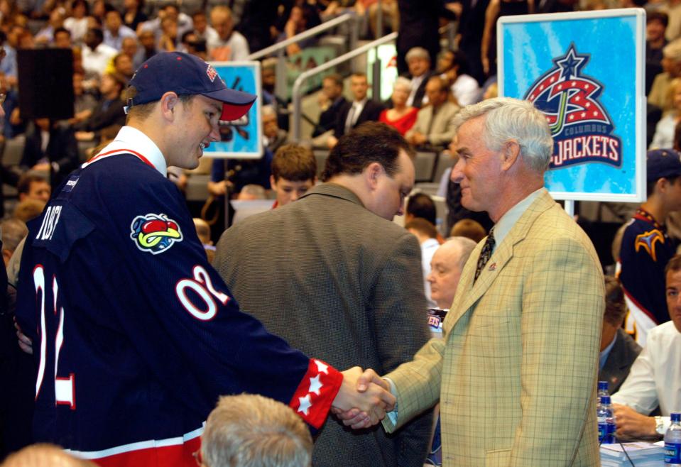 (nhl draft) Rick Nash meets Columbus Blue Jackets head coach Dave King at the Blue Jackets table after Nash was drafted first at the National Hockey League 2002 Draft at the Air Canada Center in Toronto, June 22, 2002. Nash was the Blue Jacket's first round draft choice. Dispatch photo by Neal C. Lauron