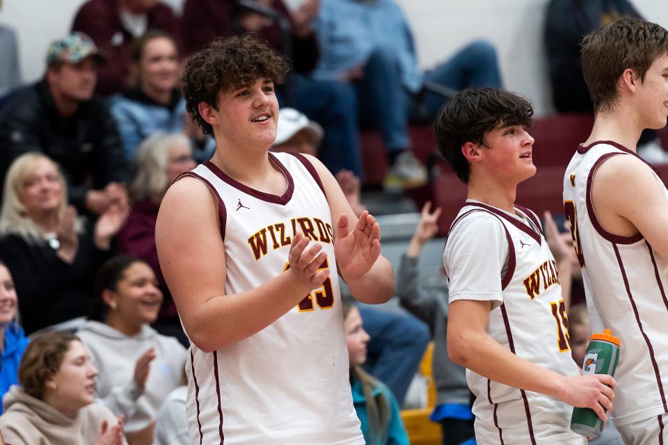 Windsor's Deacon Schmitt celebrates the Wizards's 5A basketball playoff win as they head to the Great 8 in the Denver Coliseum for a second straight season.
