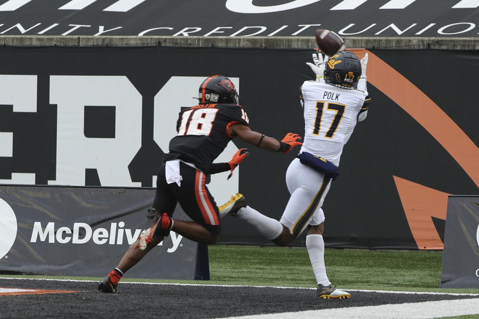 California wide receiver Makai Polk (17) catches a pass in the end zone for a touchdown while under pressure from Oregon State wide receiver Zeriah Beason (18) during the first half of an NCAA college football game in Corvallis, Ore., Saturday, Nov. 21, 2020. (AP Photo/Amanda Loman)