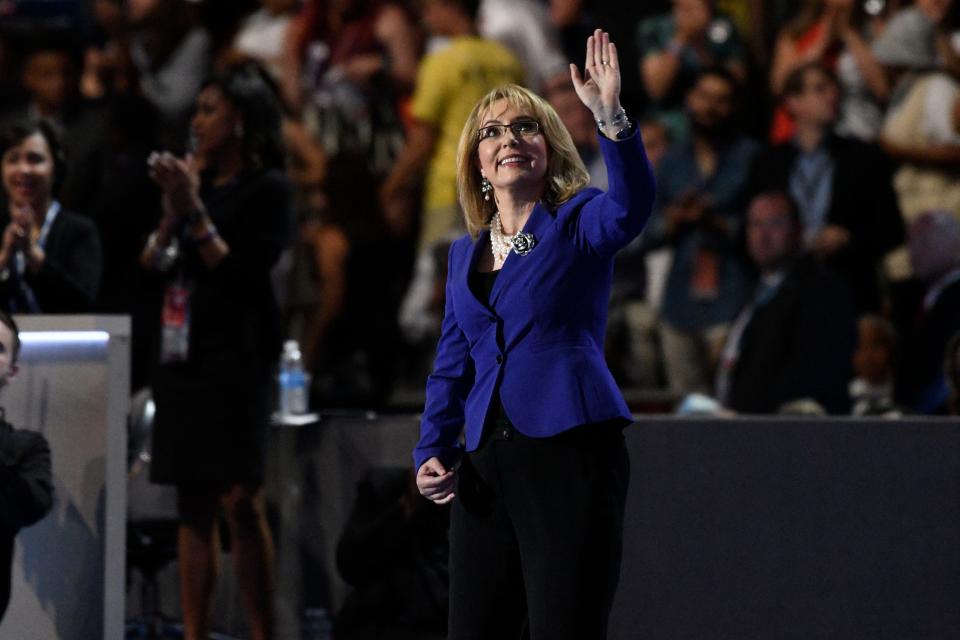 Former Rep. Gabrielle Giffords, D-AZ, makes her way on stage during the 2016 Democratic National Convention at Wells Fargo Center. Giffords was injured from a gunshot wound to her head during an assassination attempt in 2011 and was left with aphasia.