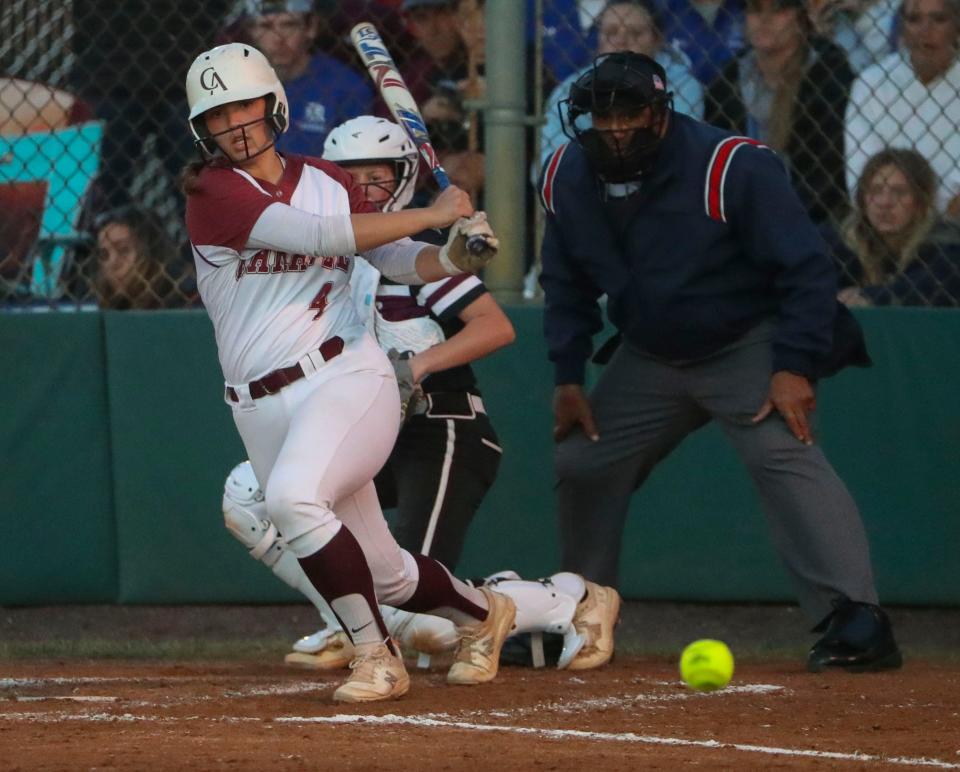 Caravel's Brooke Holdsworth singles to open her team's at bats in the third inning of the Bucs' 7-2 win Thursday, May 4, 2023