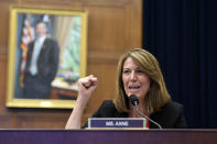 FILE - In this July 10, 2019 file photo, Rep. Cindy Axne, D-Iowa., gives a cheer for her home state of Iowa as she questions during a the House Financial Services Committee on Capitol Hill in Washington. The U.S. Chamber of Commerce has decided to endorse 23 freshmen House Democrats in this fall’s elections. The move represents a gesture of bipartisanship by the nation's largest business organization, which has long leaned strongly toward Republicans. (AP Photo/Susan Walsh)