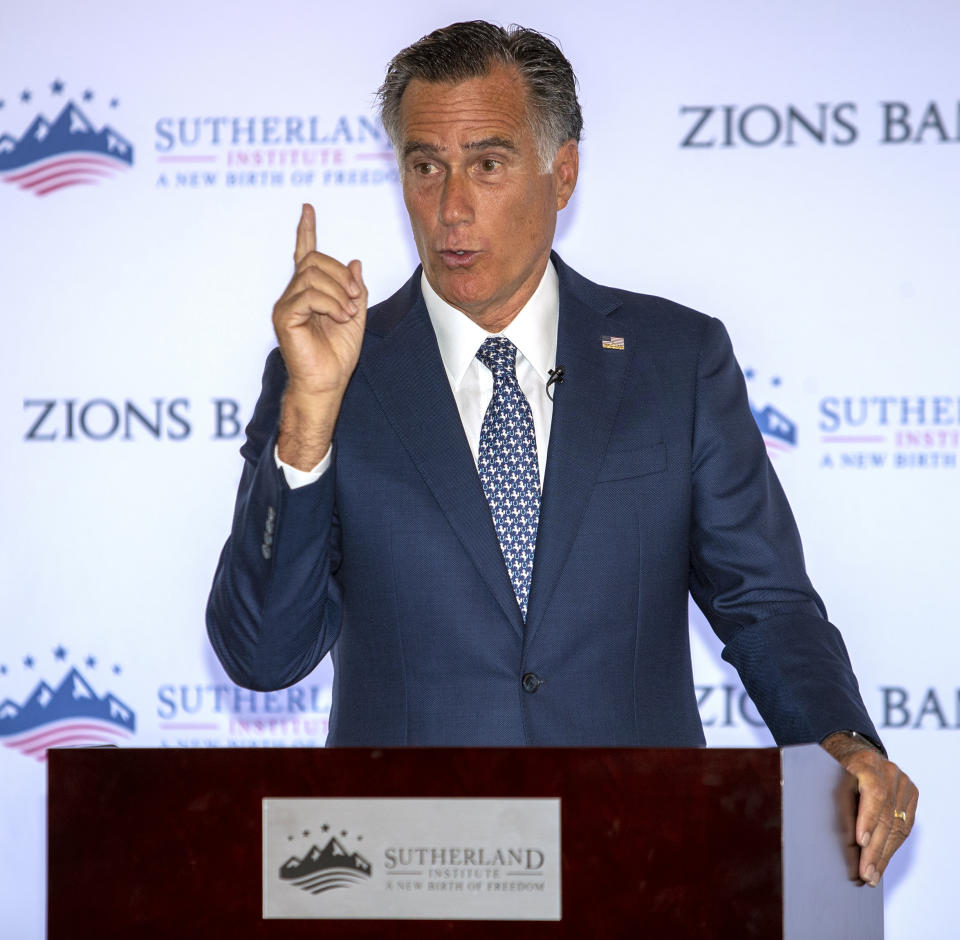 Senator Mitt Romney speaks at the Sutherland Institute in Salt Lake City on Monday, Aug. 19, 2019. Romney says he believes climate change is happening and human activity is a significant contributor. (Scott G Winterton/The Deseret News via AP)