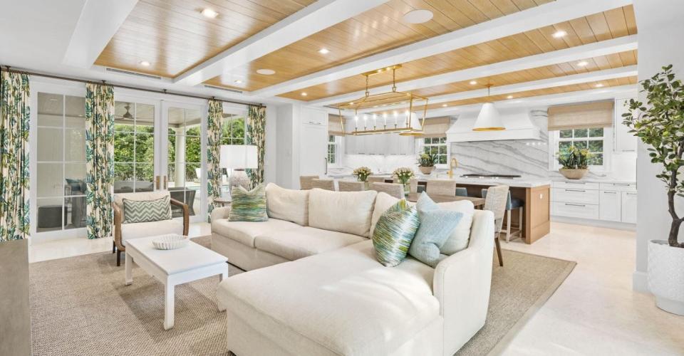 The family room is open to the kitchen at 244 Fairview Road, which is co-owned by Fox News host Bret Baier and listed at $16.495 million on the North End of Palm Beach.