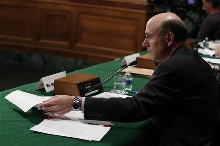 The Federal Reserve's Division of Banking and Supervision and Regulation Director Michael Gibson testifies on physical commodities before the Senate Banking subcommittee on financial institutions and consumer protection on Capitol Hill in Washington, January 15, 2014. REUTERS/Yuri Gripas