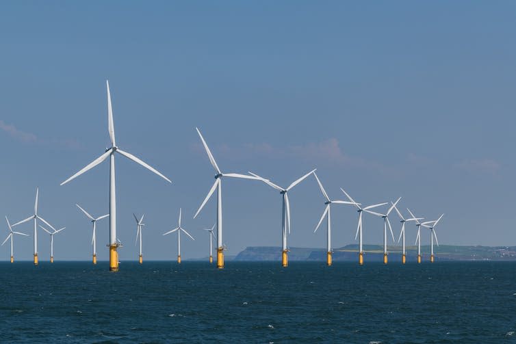 A wind farm off the coast of the UK in the North sea.