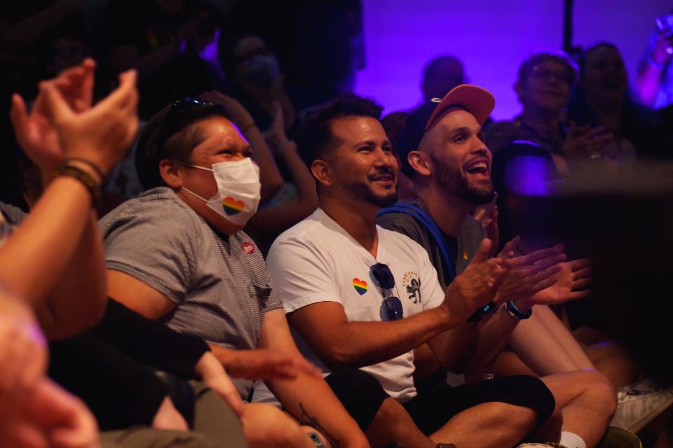 Audience members sit on the floor and watch drag performances at Native Drag Night at the Heard Museum on June 3, 2022, in downtown Phoenix, AZ.