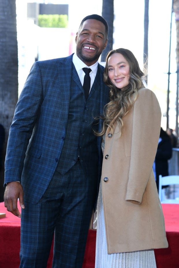 Michael Strahan and Kayla Quick attend The Hollywood Walk of Fame star ceremony honoring Michael Strahan on <a href="https://parade.com/living/january-holidays-observances" rel="nofollow noopener" target="_blank" data-ylk="slk:January" class="link ">January</a> 23, 2023, in Los Angeles, California.<p>JC Olivera/Getty Images</p>