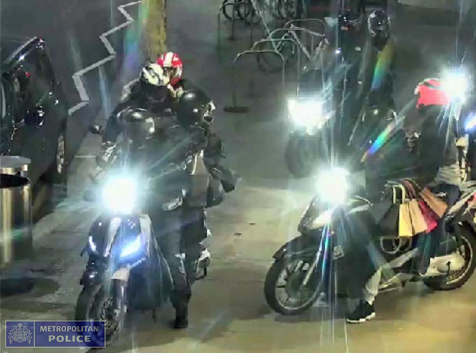 A moped gang stealing handbags from a designer shop on Duke of York Square in Chelsea, west London (Picture: PA)