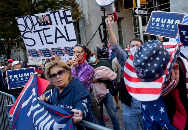 Donald Trump supporters gather outside the Pennsylvania Convention Center to protest mail-in ballots being counted on Nov. 6, 2020, in Philadelphia. (Photo: Andrew Lichtenstein/Corbis via Getty Images)