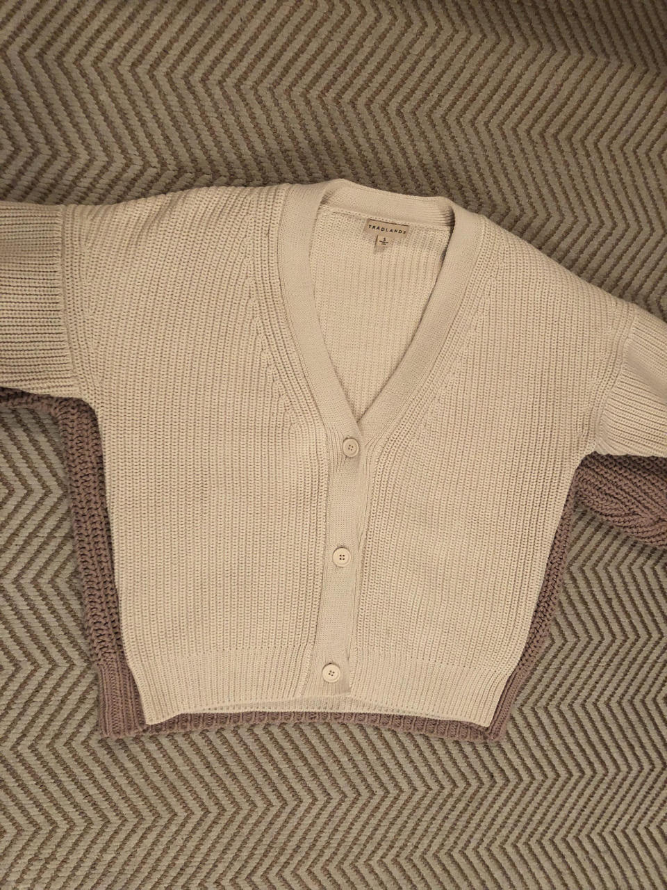 The Tradlands Shelter cardigan is more streamlined than the Babaa no. 18.