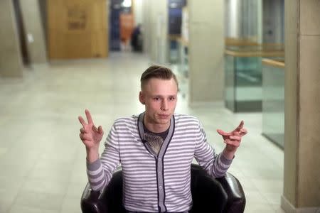 Narva college of Tartu University student Denis Larchenko gestures as he speaks in Narva, Estonia February 16, 2017. Picture taken February 16, 2017. REUTERS/Ints Kalnins