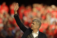 <p>Arsenal’s French manager Arsene Wenger waves to spectators during a lap of honor after the match between Arsenal and Burnley at the Emirates Stadium in London, Sunday, May 6, 2018. The match is Arsenal manager Arsene Wenger’s last home game in charge after announcing in April he will stand down as Arsenal coach at the end of the season after nearly 22 years at the helm. (AP Photo/Matt Dunham) </p>