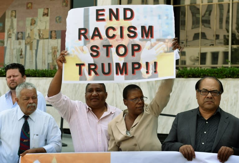 A coalition of Latino community leaders protest against the policies of Republican presidential hopeful Donald Trump, outside the Federal Building in Los Angeles, California on August 19, 2015