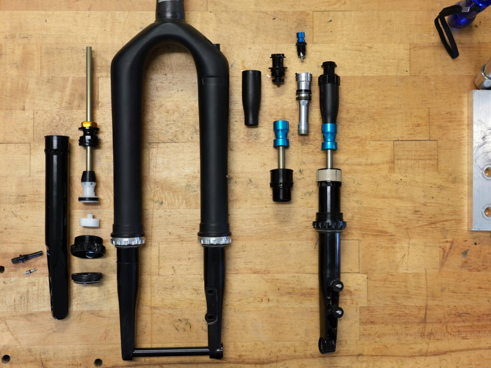 internal parts of cane creek invert fork shown disassembled