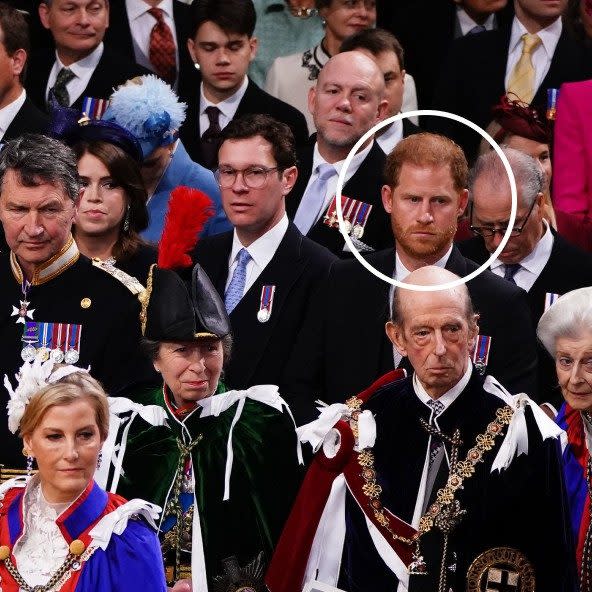 Prince Harry sits in the third row 