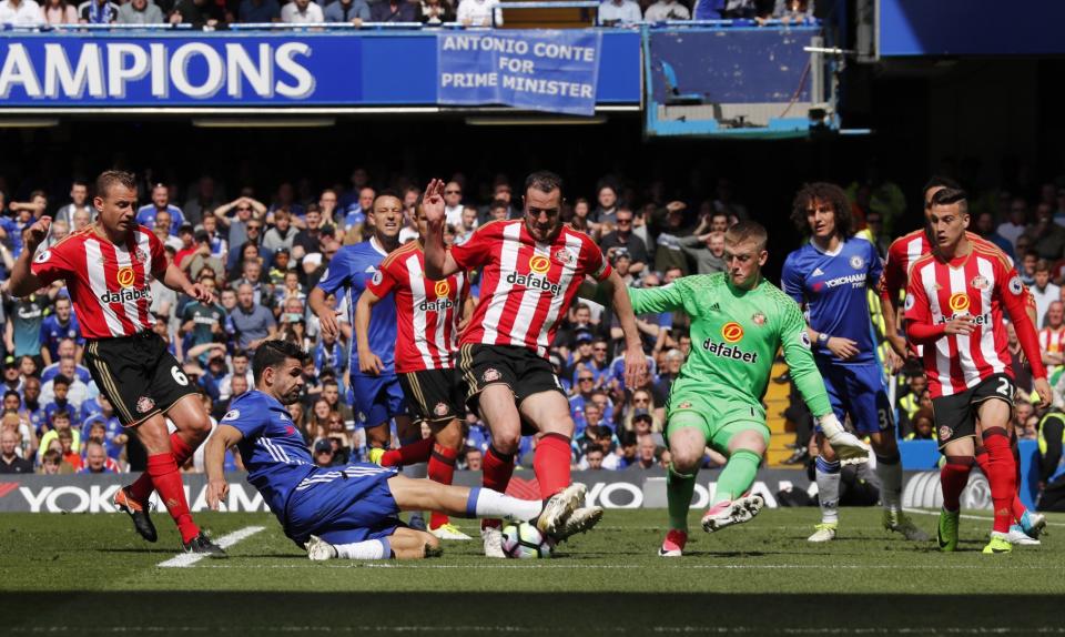 <p>Chelsea’s Diego Costa in action with Sunderland’s John O’Shea Reuters / Eddie Keogh Livepic </p>