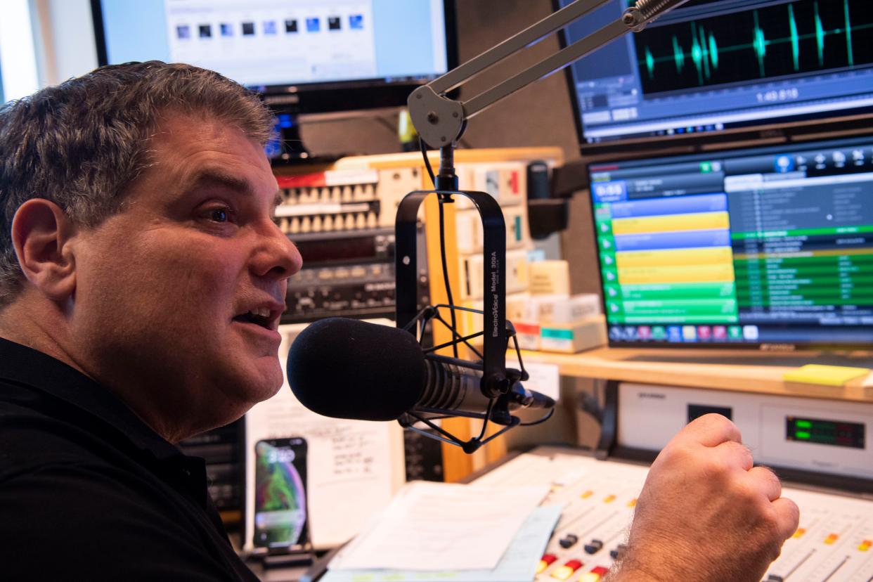 Doug Griffin, takes calls on 94FM The Fish at The Fish radio station in Nashville, Tenn., Friday, April 19, 2024.