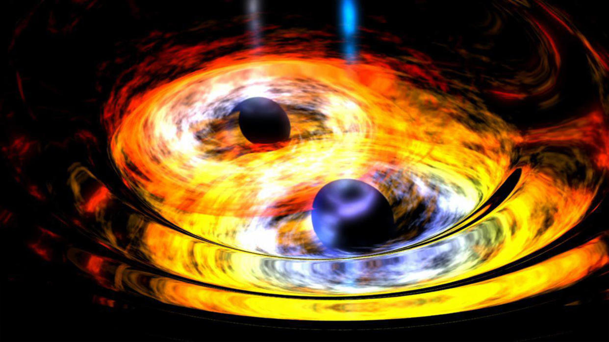  An artist's impression of two black holes subject to each other's gravity. 