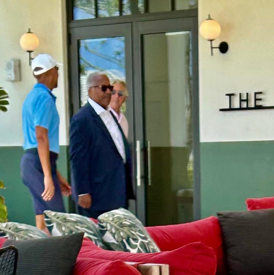 Former President of the United States Barack Obama, left, checks into The Park golf course in West Palm Beach along with West Palm Mayor Keith James, center, and PGA of America CEO Seth Waugh.