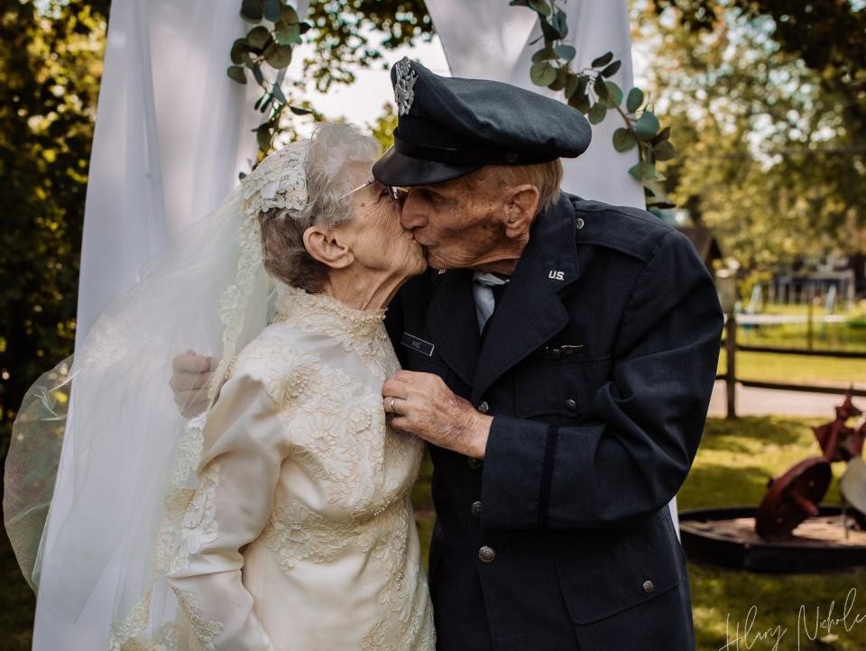 Royce and Frankie King kiss at their wedding.