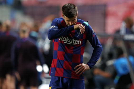 Gerard Pique reacts during Barcelona’s defeat (Getty)