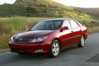 <p>The Camry once again hit a growth spurt, coinciding with a redesign in the early 2000s. The fifth-generation model had a longer wheelbase and was taller than before, with a raised seating position for the driver and front passenger and more legroom for those sitting in the back seats. To go along with the size uptick, the Camry gained a bigger base engine, a 157-hp 2.4-liter four-cylinder. The 3.0-liter V-6 stuck around, although this generation lost the combination of a V-6 and a manual transmission. At least the sporty-ish SE trim level returned to the lineup, having been abandoned for the previous-gen Camry, and for the first time the Toyota was offered with an in-dash navigation system.</p>