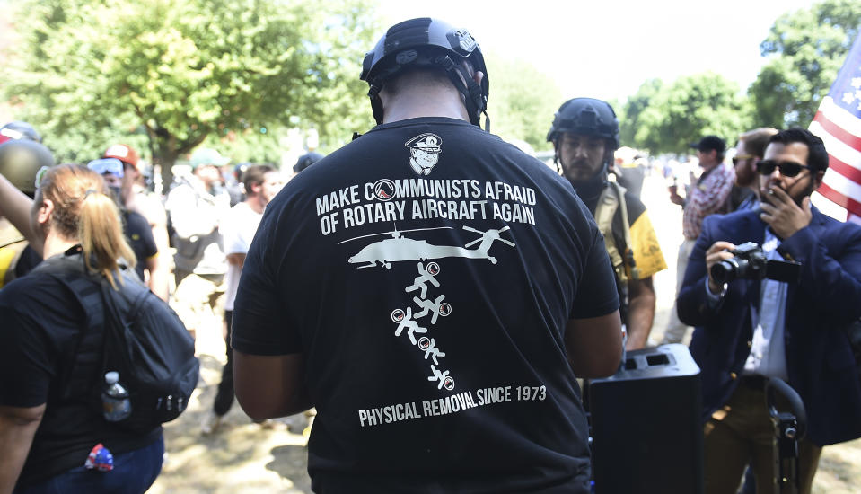 <p>Members of Patriot Prayer demonstrate during the alt-right rally at Tom McCall Waterfront Park on Aug. 4, 2018 in Portland, Ore. (Photo: Steve Dykes/Getty Images) </p>