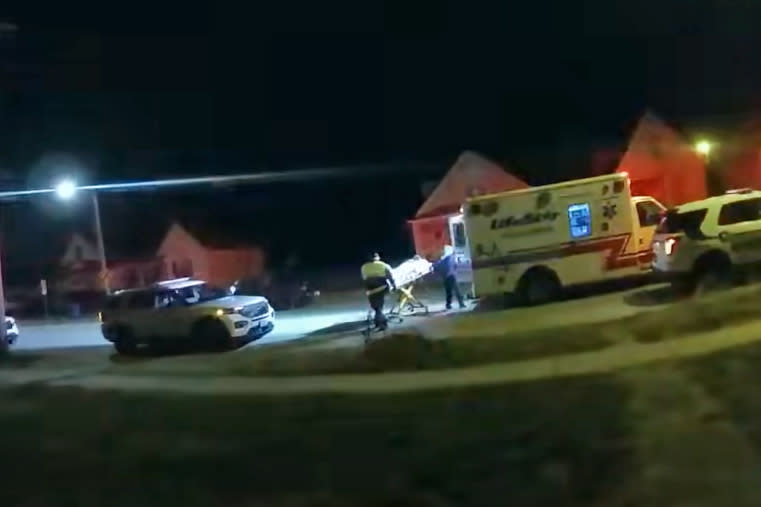 Paramedics load Earl Moore into an ambulance on Dec. 18, 2022, in Springfield, Ill. (Sangamon County Government)