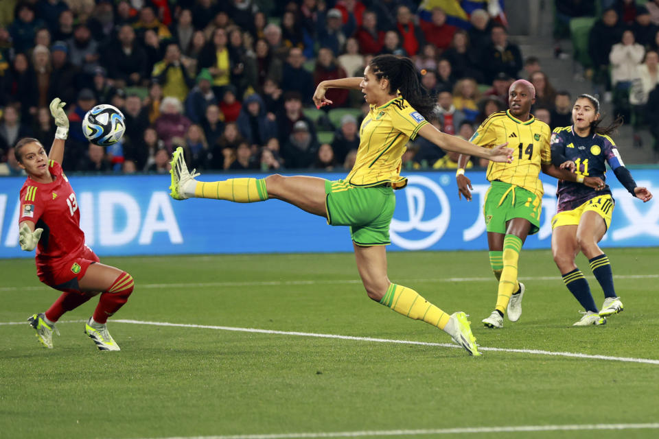 Colombia's Catalina Usme, center, scores her side's first goal during the Women's World Cup round of 16 soccer match between Jamaica and Colombia in Melbourne, Australia, Tuesday, Aug. 8, 2023. (AP Photo/Hamish Blair)