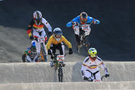 LONDON, ENGLAND - AUGUST 09: Brian Kirkham (C) of Australia races during the Men's BMX Cycling Quarter Finals on Day 13 of the London 2012 Olympic Games at BMX Track on August 9, 2012 in London, England. (Photo by Phil Walter/Getty Images)