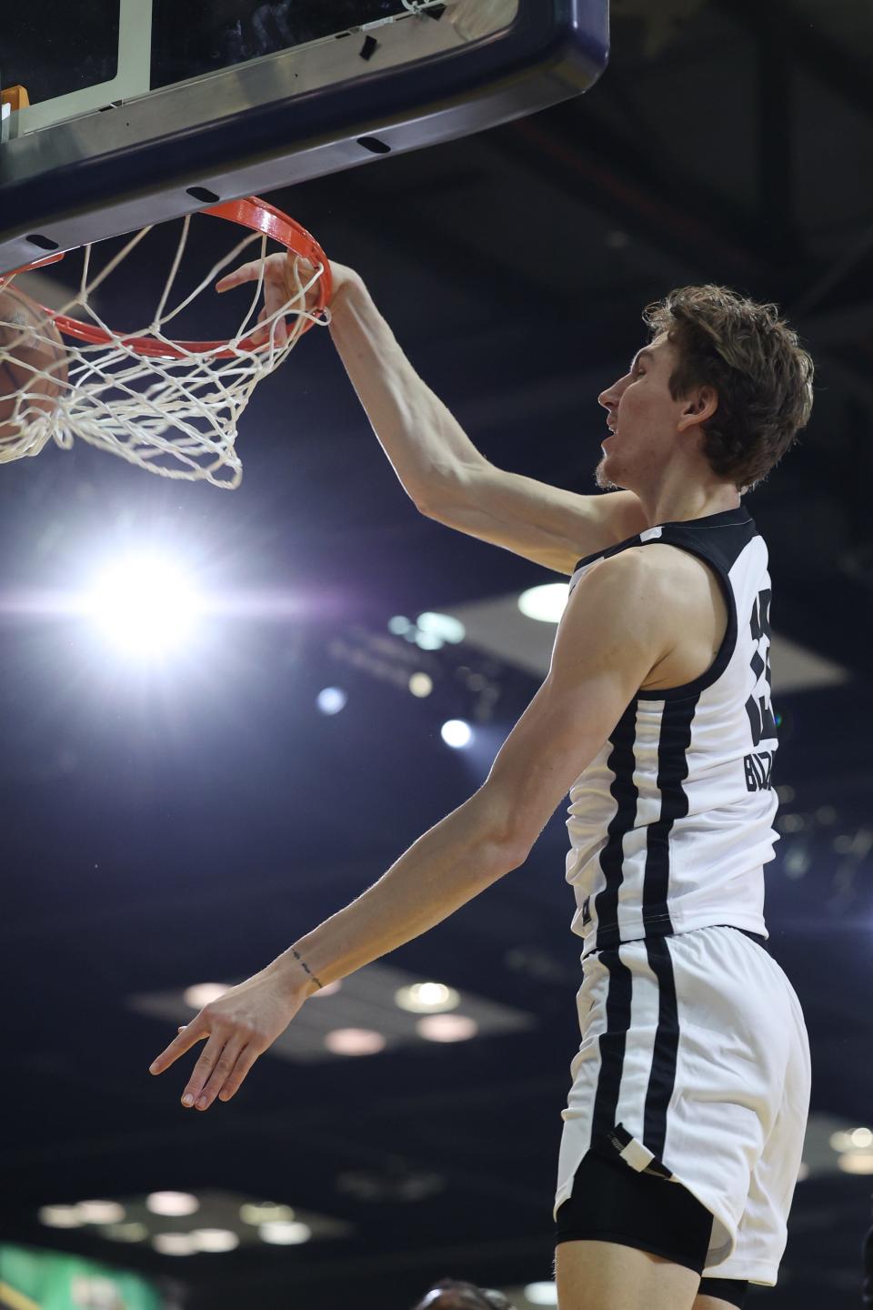 Team Giraffe Stars forward Matas Buzelis (13) of the G League Ignite goes to the basket in a game at Indiana Convention Center, Feb. 18, 2024 in Indianapolis.