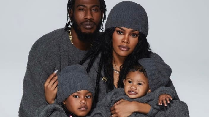 Family forever: Iman Shumpert (left), Teyana Taylor (right) and their two daughters, Iman Tayla Jr. (bottom left), known as Junie, and Rue Rose (bottom right), are featured in the new SKIMS Cozy Collection campaign. (Photo: Screenshot/Twitter)