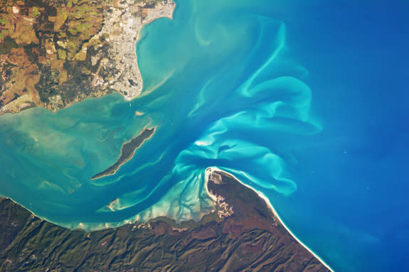 The Great Sandy Strait is an estuary that separates the coastline of the state of Queensland, Australia, from neighboring Fraser Island.