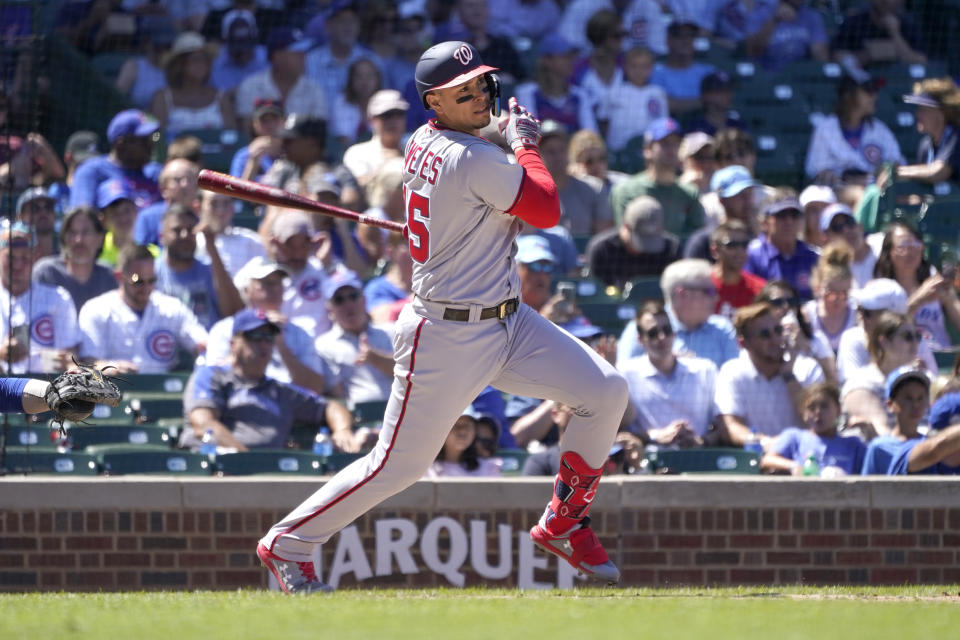 Washington Nationals' Joey Meneses watches his single off Chicago Cubs starting pitcher Justin Steele during the fourth inning of a baseball game Wednesday, Aug. 10, 2022, in Chicago. (AP Photo/Charles Rex Arbogast)