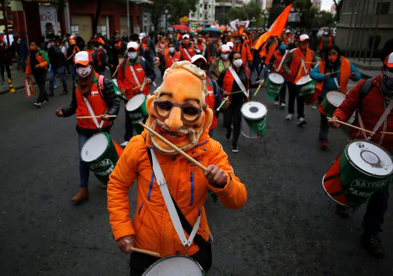 FILE PHOTO: Followers of presidential candidate and Bolivia's former President Carlos Mesa parade through the streets before the elections on October 18, in La Paz