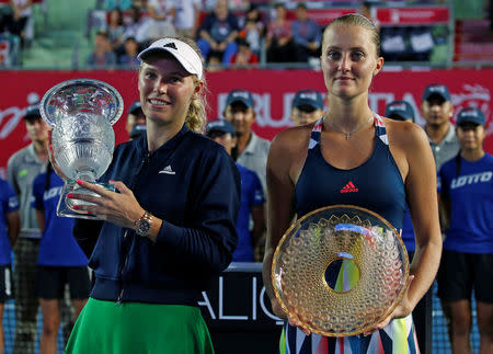 Tennis - Hong Kong Open final - Caroline Wozniacki of Denmark v Kristina Mladenovic of France - Hong Kong, China - 16/10/16. Wozniacki (L) and Mladenovic pose after match. REUTERS/Bobby Yip