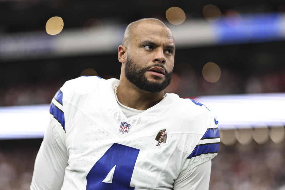 A lawsuit filed by Dak Prescott accuses a woman of seeking to extort $100 million by falsely accusing him of sexual assault.  (Michael Owens/Getty Images)